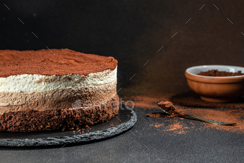 Freshly made delicious chocolate cake on a dark background. banner, menu, recipe place for text