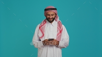 Cheerful person messaging on phone