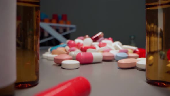 Zoom in Video of Medication Pills and Vials on Table Close Up