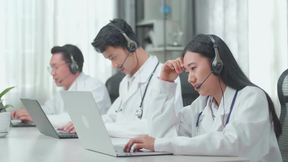 A Woman Of Three Asian Doctors Headache While Working As Call Centre Agent