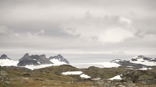 Clouds over Snowy Mountains, Norway. Timelapse