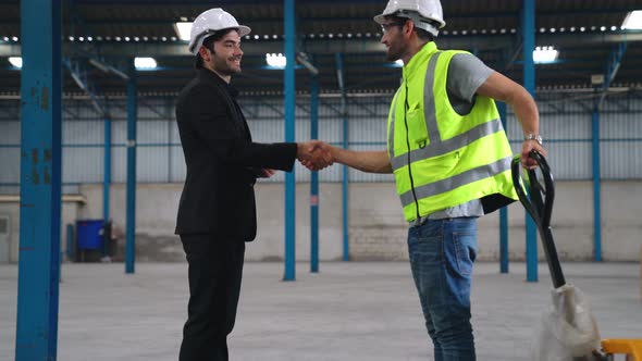 Successful Work Partner Handshake Showing Project Success