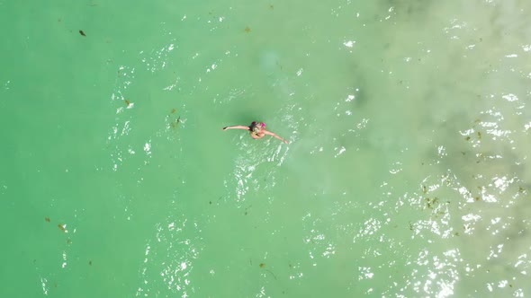 Aerial View From Drone on Caribbean Sea with Swimming Woman