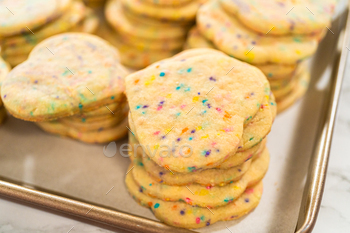 Packing Sprinkle-Adorned Sugar Cookies into Boxes