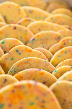 Packing Sprinkle-Adorned Sugar Cookies into Boxes