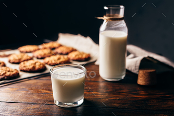 Glass of Milk and Oatmeal Cookies.