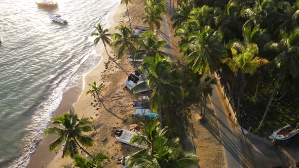 Drone video of beach with fisherman boats