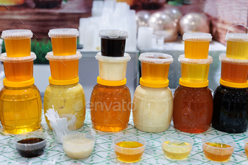 Clear honey, organic honey in farm shop.