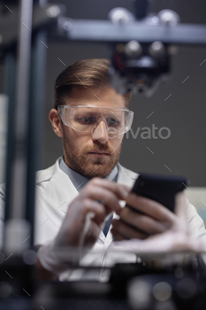 Male Technician Working in 3D Printing Laboratory