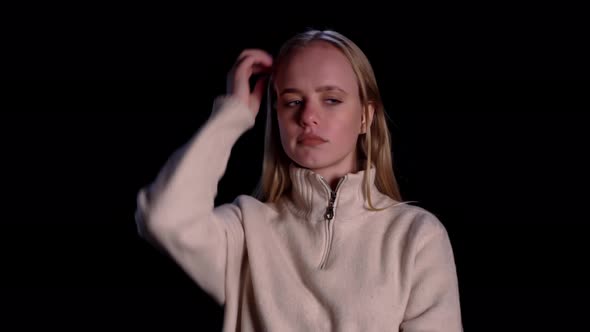 Young Confused Girl Standing Isolated Over Black Background Looking Camera