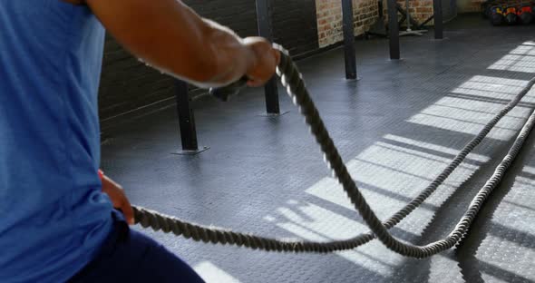Senior Man Doing Crossfit Rope Training in The Fitness Studio 4k