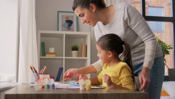 Mother with Little Daughter Drawing at Home