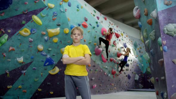 Caucasian Teenager Posing at Climbing Gym