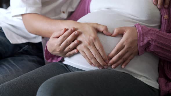 Pregnant Couple Feels Love and Relax at Home