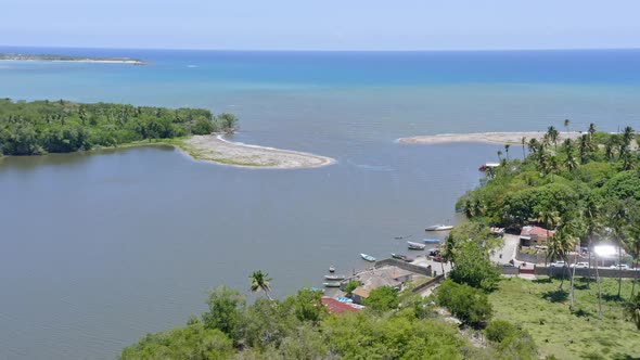 Drone view of Soco river mouth entering the ocean with sandbanks