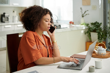 Woman Answering Phone Calls and E-mails