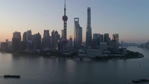 Aerial view of Shanghai skyline at sunset, China.