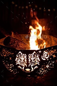 Fire pit with a image of a wolf