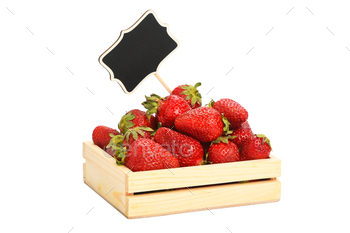 Strawberry in wooden box with price sign