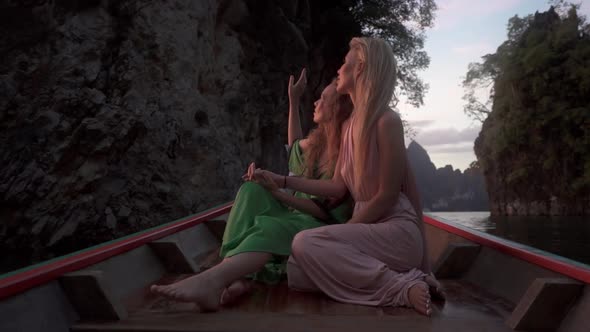 Two Women Appreciating Cheow Lan Lake