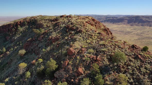 Summit of Mt Bruce, Karijini National Park, Western Australia Sunrise Sunset 4K Aerial Drone