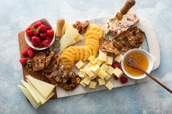 Cheese board or snack board with crackers