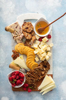 Cheese board or snack board with crackers