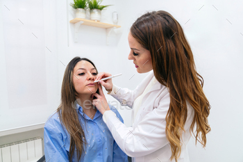 Aesthetician Applying Makeup on Patient for a Skin Analysis