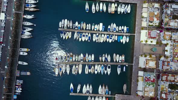 Aerial view of the yachts parked in the docks in a luxury resort in Spain