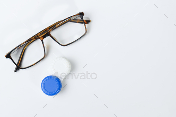 glasses and contact lenses isolated on white background