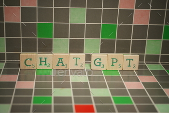 Tile with green chat gpt text on a blocked background