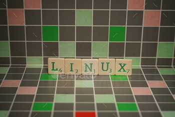 Tile with green linux text on a blocked background