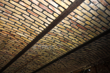 Close up vaulted brick ceiling in the old house. Major repairs
