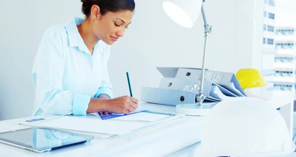 woman drawing design and using tablet computer