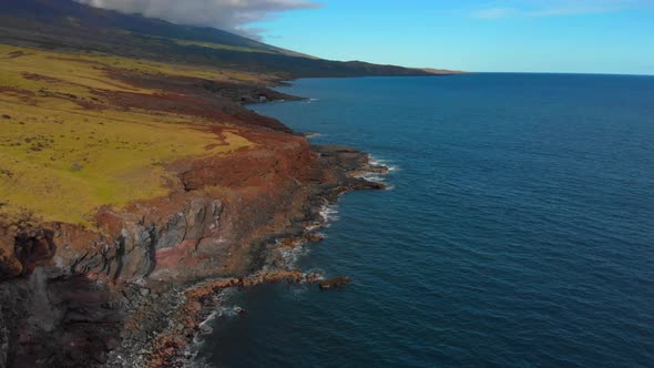 Beautiful epic 4k Drone shot in Maui. Off Highway 31 leaving Hana. Rugged coast, barren isolated.