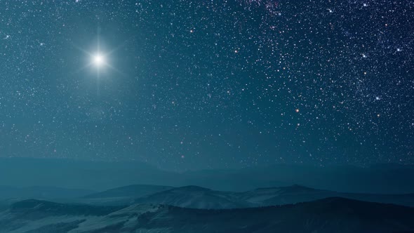 The star shines over the manger of christmas of Jesus Christ.