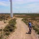 Man On Mountain Bike Amoung Windmills - VideoHive Item for Sale