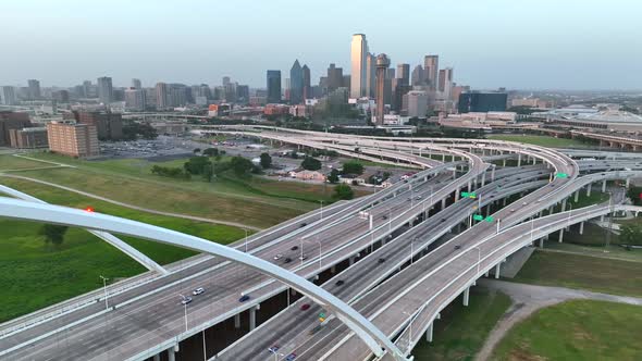 Aerial establishing shot of Dallas Texas during day. Pullback reveal.