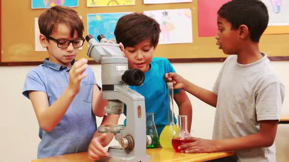 Pupils doing science together in class