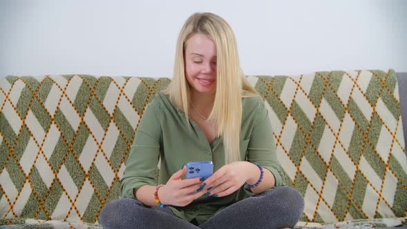 Domestic violence survivor female with prosthetic eye and facial scars communicating online