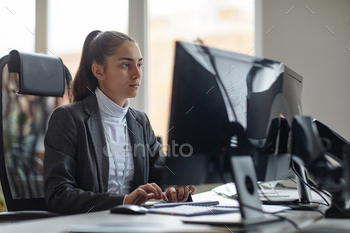 Female IT Developer Using Computer