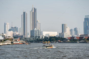 Bangkok Skyline with Boat Traffic.