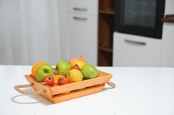 fruits in a wooden box in the kitchen. handmade box.