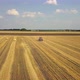 Tractor Producing Hay Bales - VideoHive Item for Sale