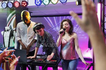 Dj and singer performing in nightclub