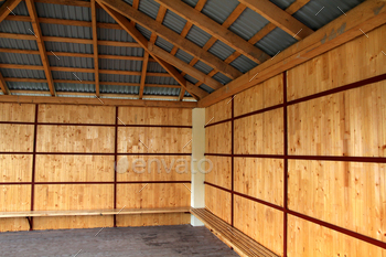 Wooden frame of new roof from inside. Construction framework.