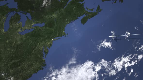 Commercial Airplane Flying To New York City alt