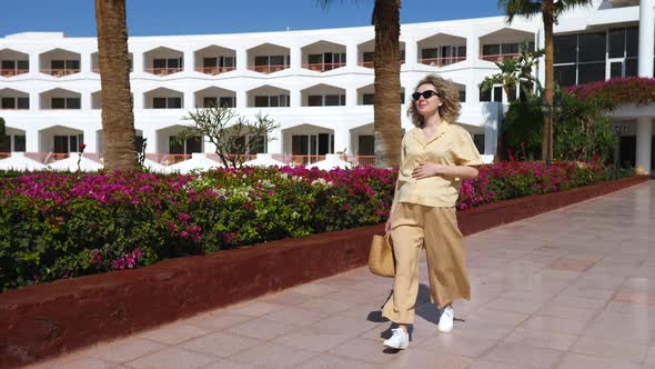 Pregnant Woman Walking In Summer On Vacation In Hotel Resort