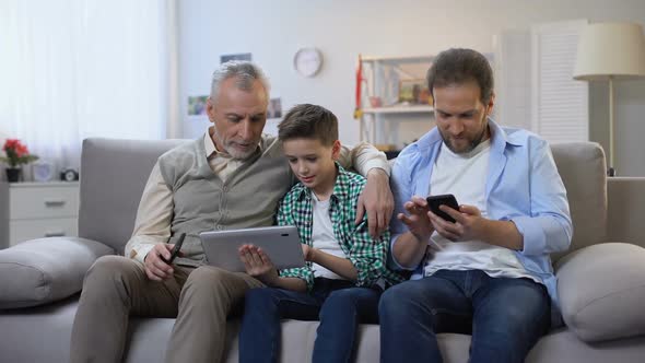 Multiage Family Members Choosing Presents Online, Mobile Shopping Application