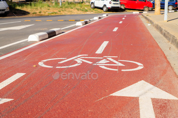 Bicycle lane ath on the road with directional arrows in Valencia